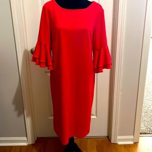 Beautiful Coral dress with ruffle sleeves